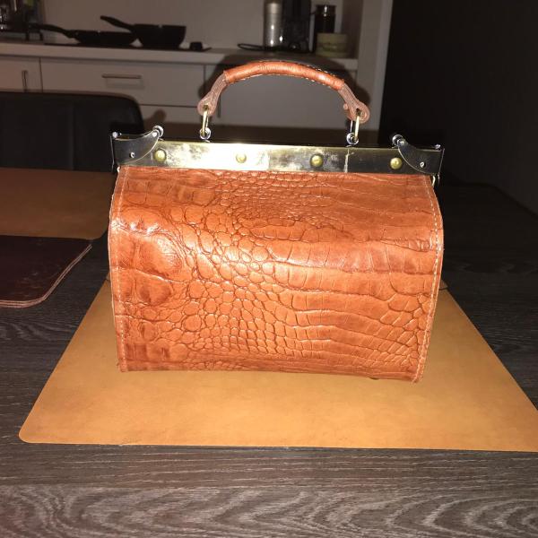 Tas met krokodil motief